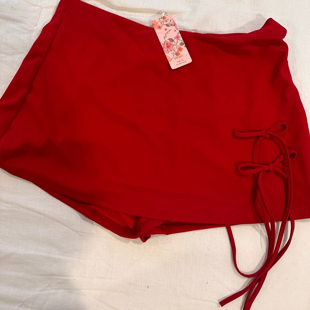 Red skirt with bow details